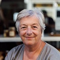 Portrait de Monique, commerçante utilisant ActiPay